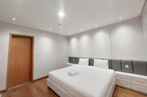 Brand New and Nice 2BR Apartment at The Reiz Condominium Medan By Travelio
